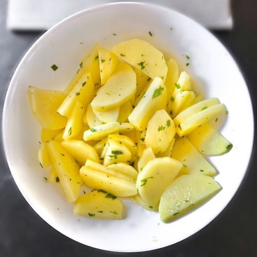 Patate con pomodorini al forno